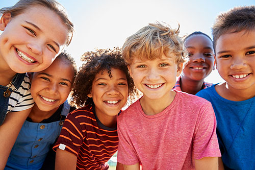 Close,Up,Of,Pre-teen,Friends,In,A,Park,Smiling,To Close,Up,Of,Pre-teen,Friends,In,A,Park,Smiling,To